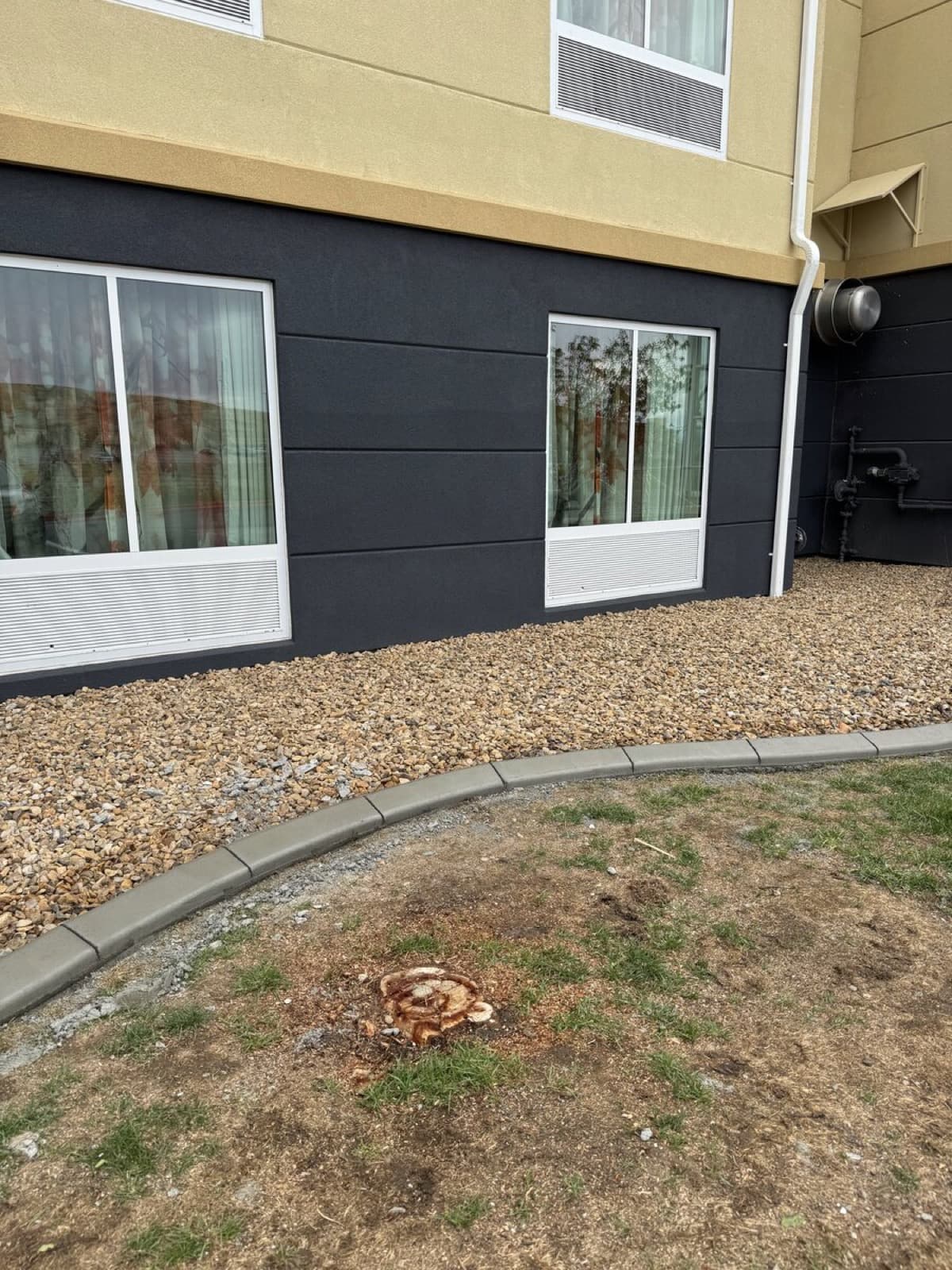 Commercial landscape curbing installation at a Black Hills business property