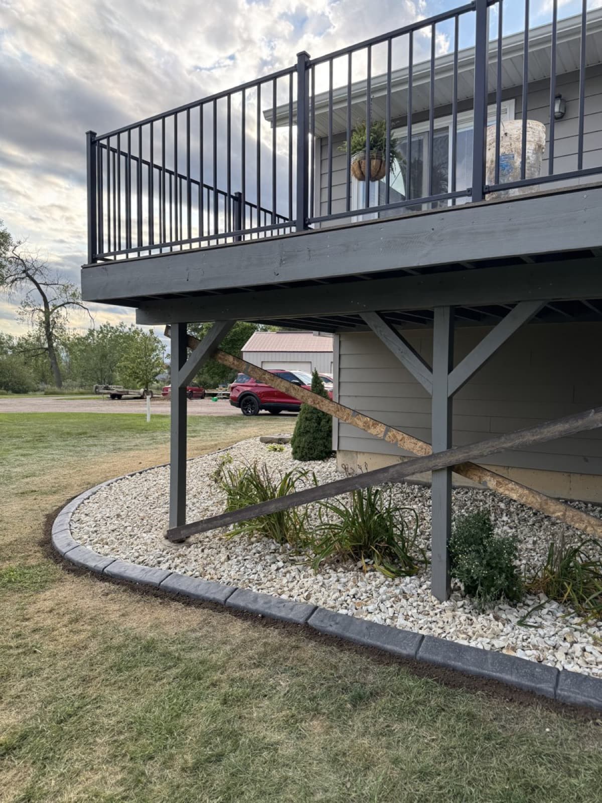 Decorative rock feature with boulder placement and landscape design