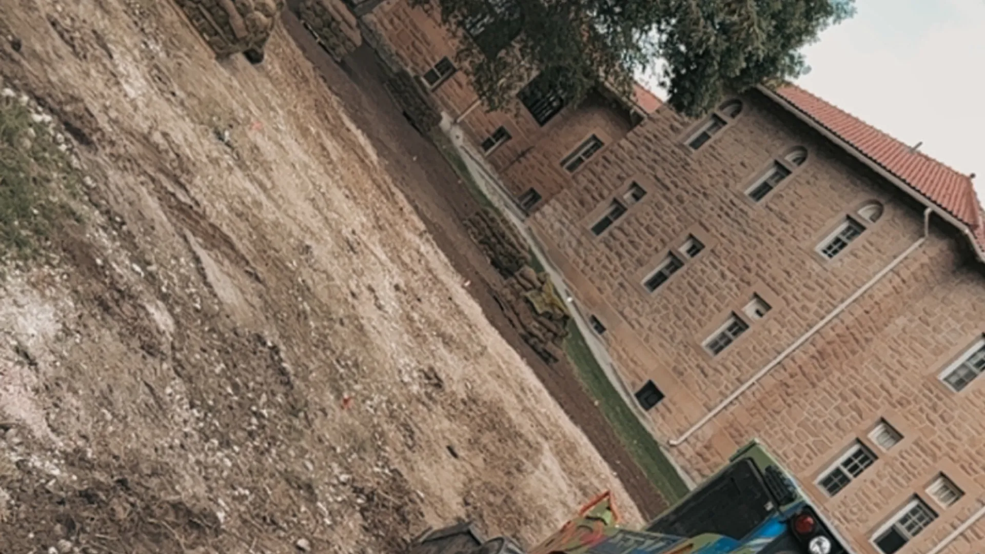 ATK Landscaping commercial project with heavy equipment at a Black Hills business property